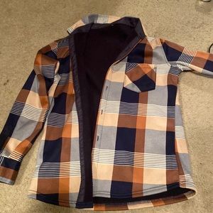 Only worn once or twice. Flannel button up with fleece like inside material